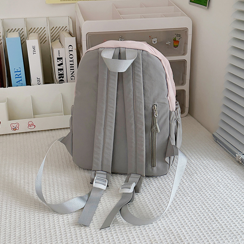 This is a lightweight and stylish summer travel and study backpack for children. It is a versatile cherry blossom pink mini backpack with a girlish heart Specification drawing