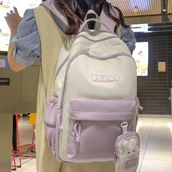 The new schoolbag for girls in the campus is a Korean-style Instagram color-blocking and patchwork backpack for primary and secondary school students from grades three to six details Picture