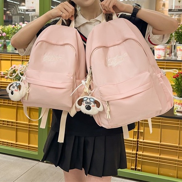 A new high-appearance-level Korean style ins high-appearance-level cream-colored fresh and sweet backpack, a lightweight backpack for junior and senior high school students full figure