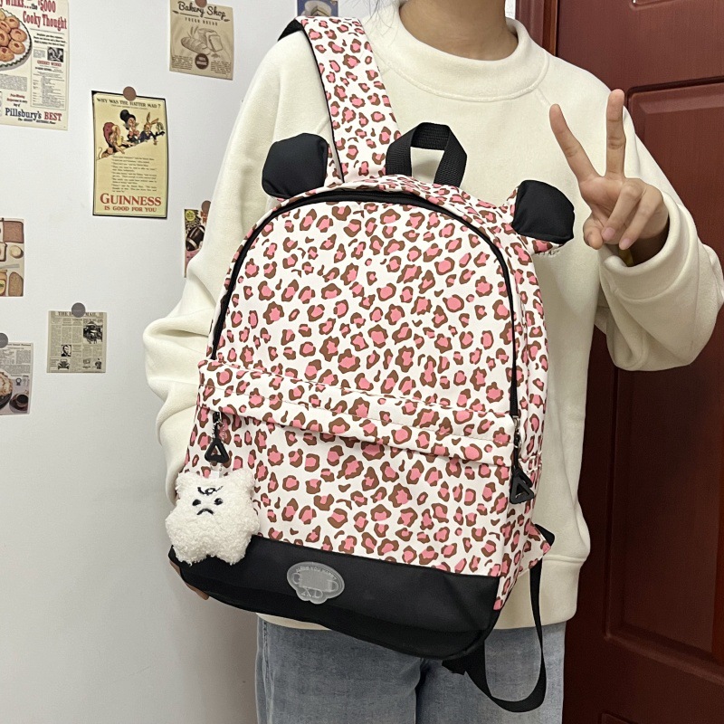 A new large-capacity cat ear leopard print backpack for college students on a niche campus, a casual and simple commuting backpack details Picture