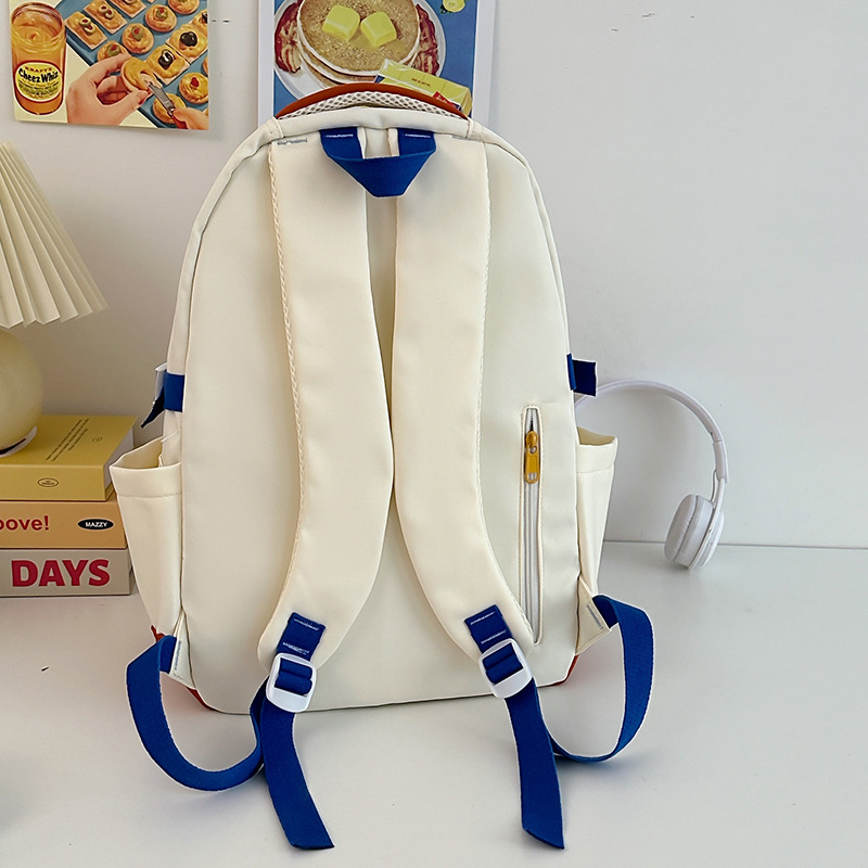 A new 2024 Korean-style, fresh and color-blocking backpack for women, a large-capacity travel backpack, and a school bag for college students Application Scenario