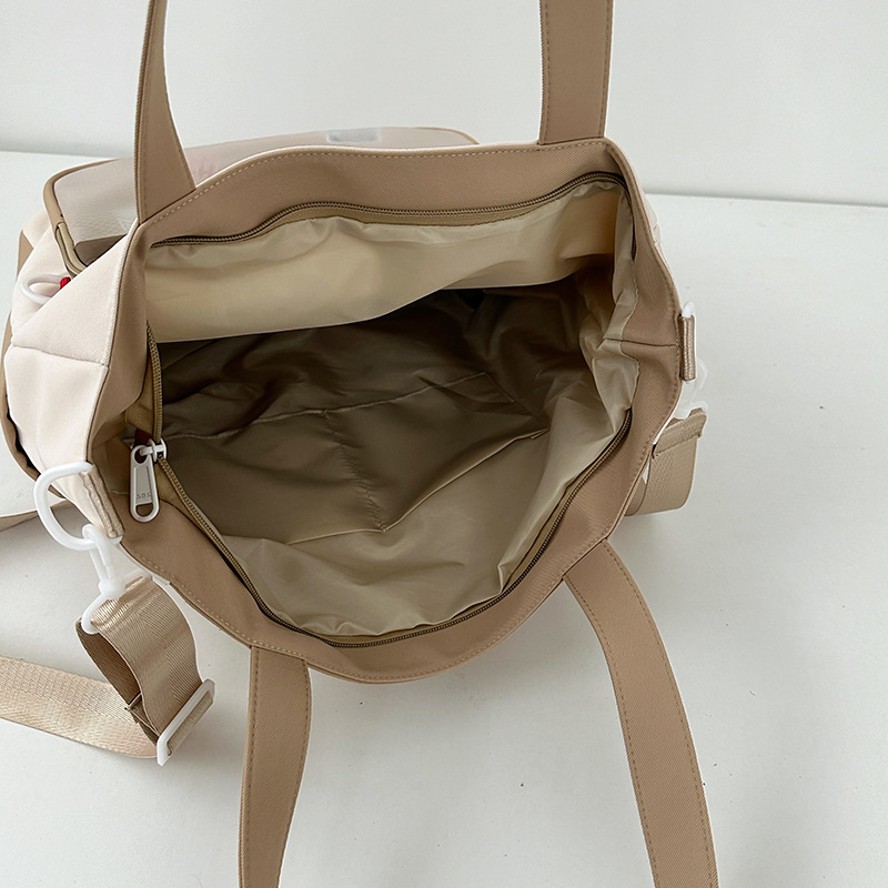 2025 New Korean version large-capacity tutorial bag, primary school single-shoulder bag, handbag, tutorial bag, crossbody art schoolbag Application Scenario