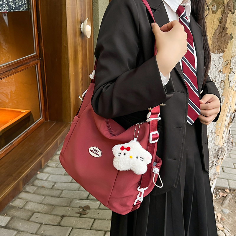 Korean-style ins campus casual small square bag, solid color, simple and sweet, girlish mini backpack, daily tote bag details Picture