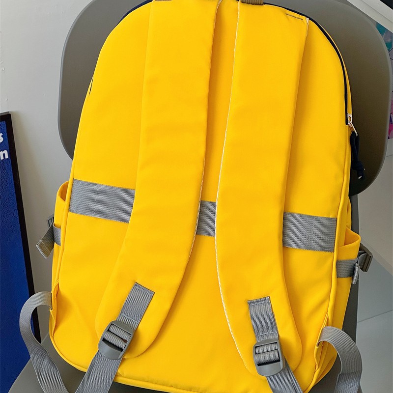 A new high-appeal, fresh and college-style ins backpack for junior and senior high school students. It features a simple, lightweight and large-capacity backpack with contrasting colors Specification drawing
