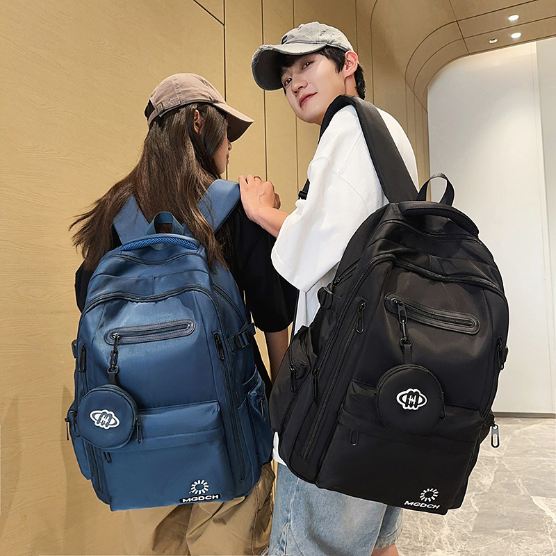 A new Korean-style ins high-appeartion-level solid-color backpack for couples, a casual, simple and lightweight travel backpack with large capacity full figure