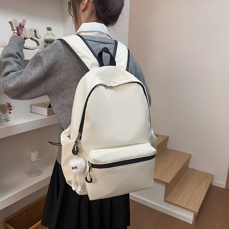 Japanese-style solid-color letter fashionable backpack, Korean-style college student lightweight schoolbag, large-capacity backpack for outdoor travel details Picture