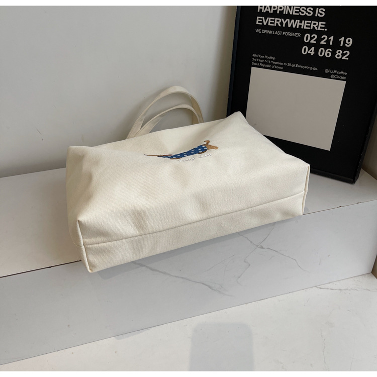2025 New Korean Ins-style cute canvas crossbody bag, large-capacity laid-back tote bag, commuter dumpling bag Specification drawing