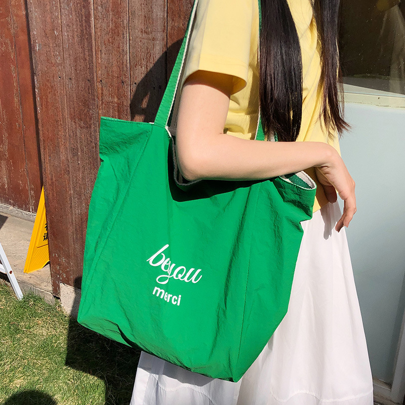 Korean-style Instagram niche and laid-back striped large bag, student commuting single-shoulder bag, double-sided crossbody bag, casual backpack full figure