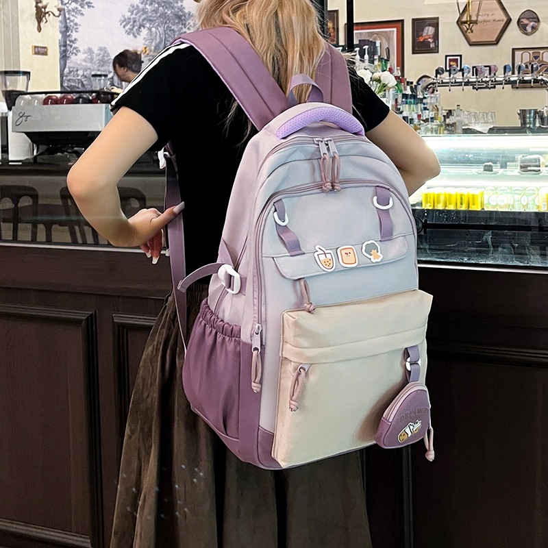 A new high-appeal, fresh and college-style backpack from Korean Instagram, featuring color-blocking and large-capacity backpacks for junior and senior high school students full figure