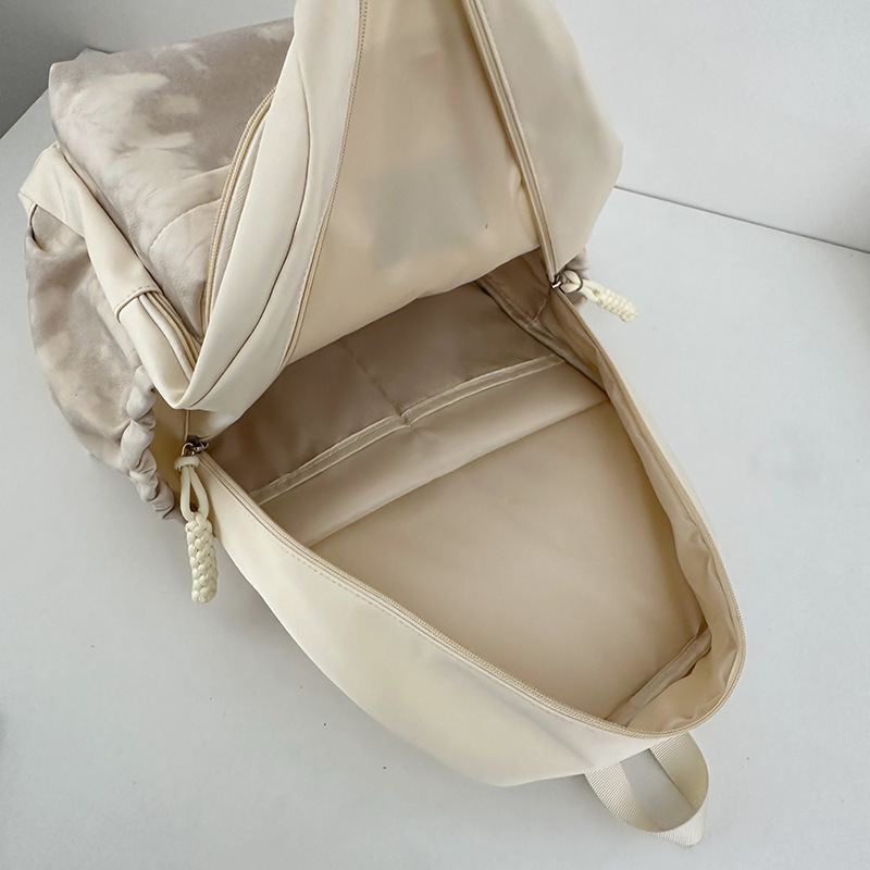 2025 New Japanese-style tie-dyed backpack, Korean-style fashionable and cute large-capacity schoolbag, casual and simple commuting backpack Application Scenario