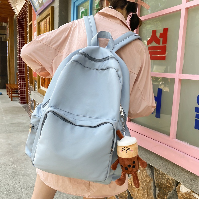 2023 New Forest-style simple schoolbag for women, large-capacity water-resistant student backpack, high appearance level girls' backpack details Picture