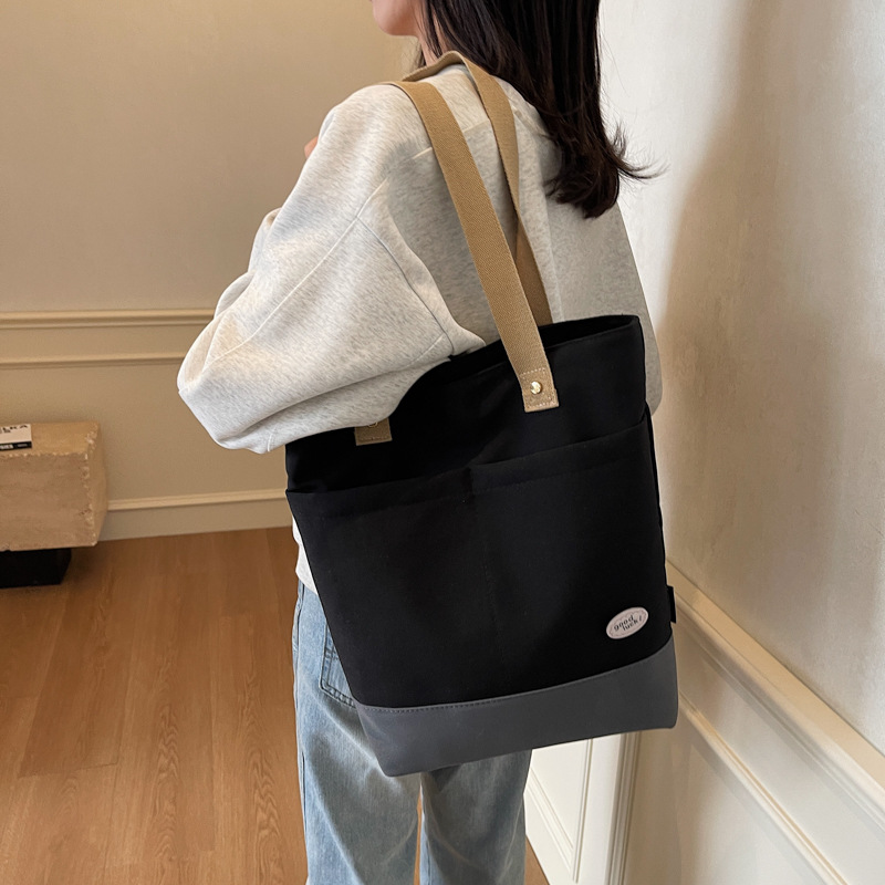 Casual commuting bag, women's large-capacity bag, 2025 new style fashionable hand-held shoulder canvas bag, work tote bag details Picture