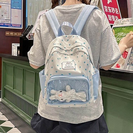 A new mini backpack with a high level of appearance, featuring a fresh, sweet and cute college style, and a star-shaped girl's backpack for traveling and shopping full figure
