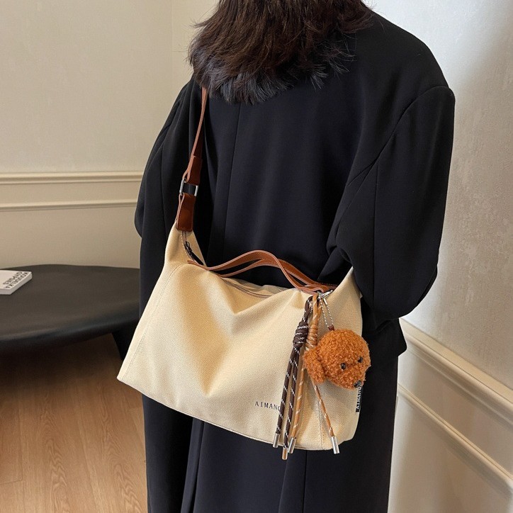 Casual crossbody canvas bag for women, Spring 2025 new style, large-capacity versatile tote bag, simple commuting single-shoulder bag full figure