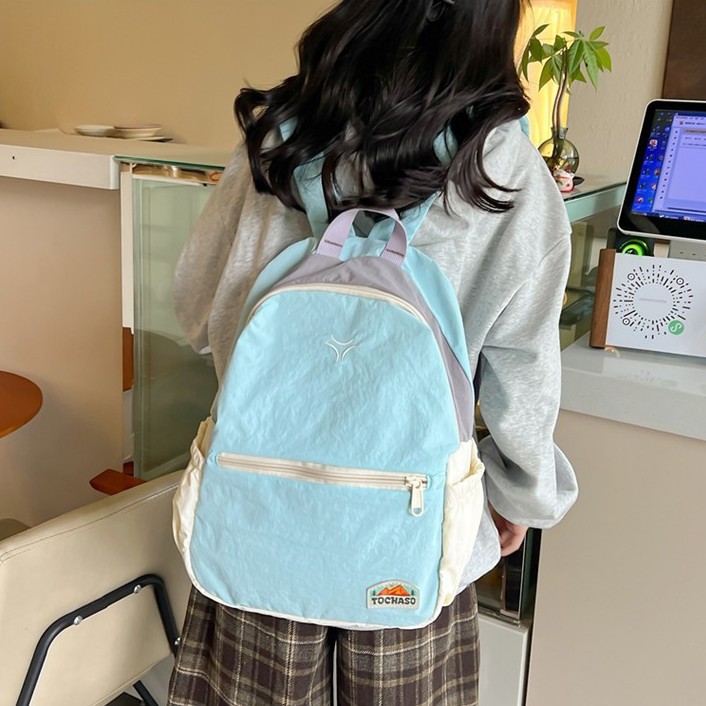 Spring color-blocking schoolbag, girls' high school appearance level, children's travel lightweight small backpack, sweet girl travel storage backpack details Picture