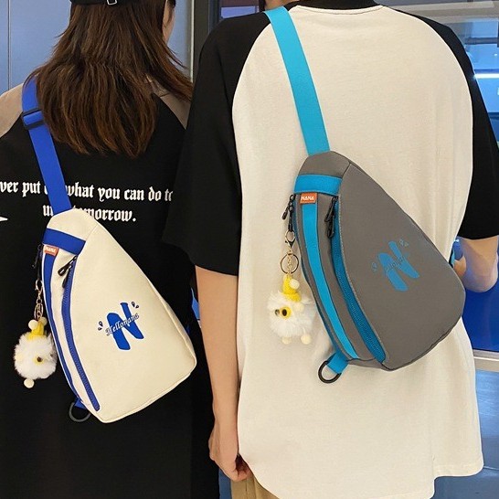 A new Korean ins workwear style off-the-shoulder bag for couples, a lightweight mountaineering and travel crossbody bag details Picture