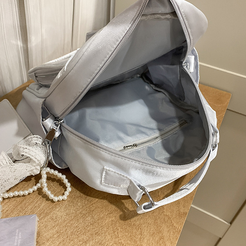 A new high-appearance-level smog blue mini backpack for shopping and traveling, a niche 2D crossbody bag Application Scenario