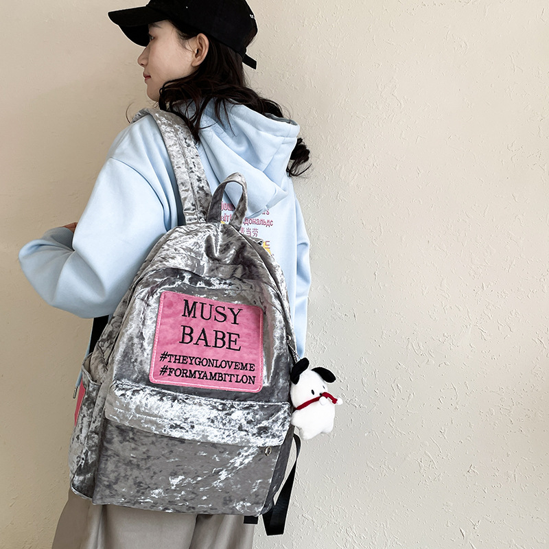 A new type of casual velvet backpack for women in 2024, a versatile and trendy large-capacity student letter backpack details Picture