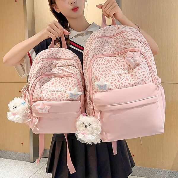 The new high-appeal, fresh and sweet, color-blocking leopard print mini backpack is a lightweight and large-capacity backpack for junior and senior high school students full figure