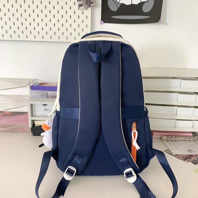 The 2025 new large-capacity, color-blocking, fashionable, multi-layered backpack for junior and senior high school students is versatile, simple and casual Specification drawing