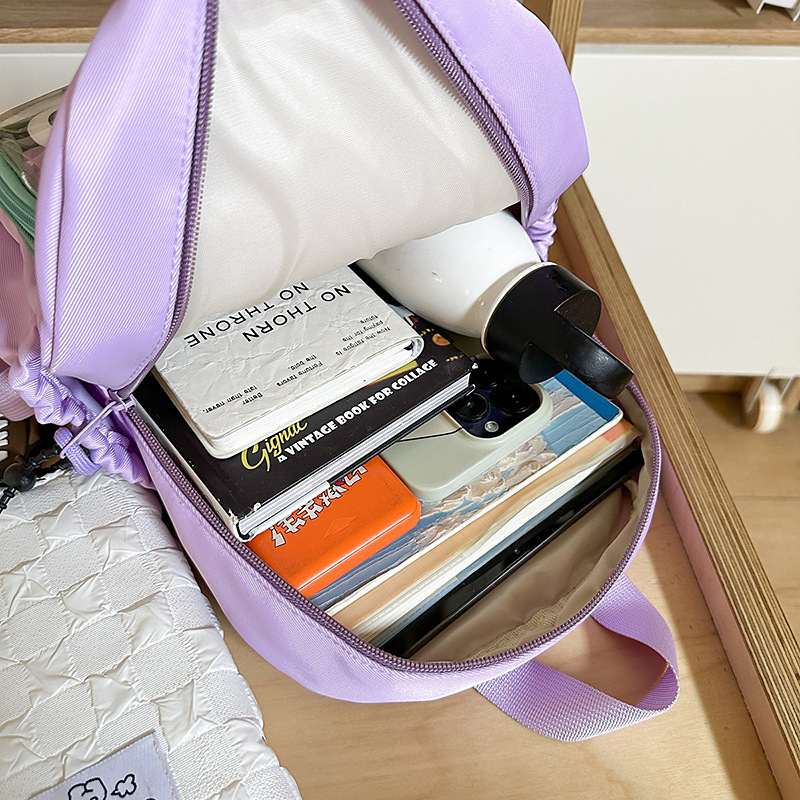 A new high-appearance-level, fresh and sweet "smug pain bag" from Korean Instagram, a casual, simple and lightweight backpack for primary and secondary school students Application Scenario