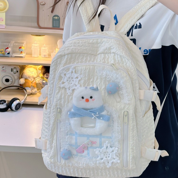 A new high-appearance-level Japanese-style ins fresh and cute snowflake snowman backpack for girls, middle and primary school students in grades 3 to 6 full figure