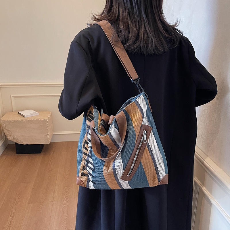 Casual striped simple large-capacity bag for women 2025 new trendy and versatile ins commuter single-shoulder tote bag details Picture