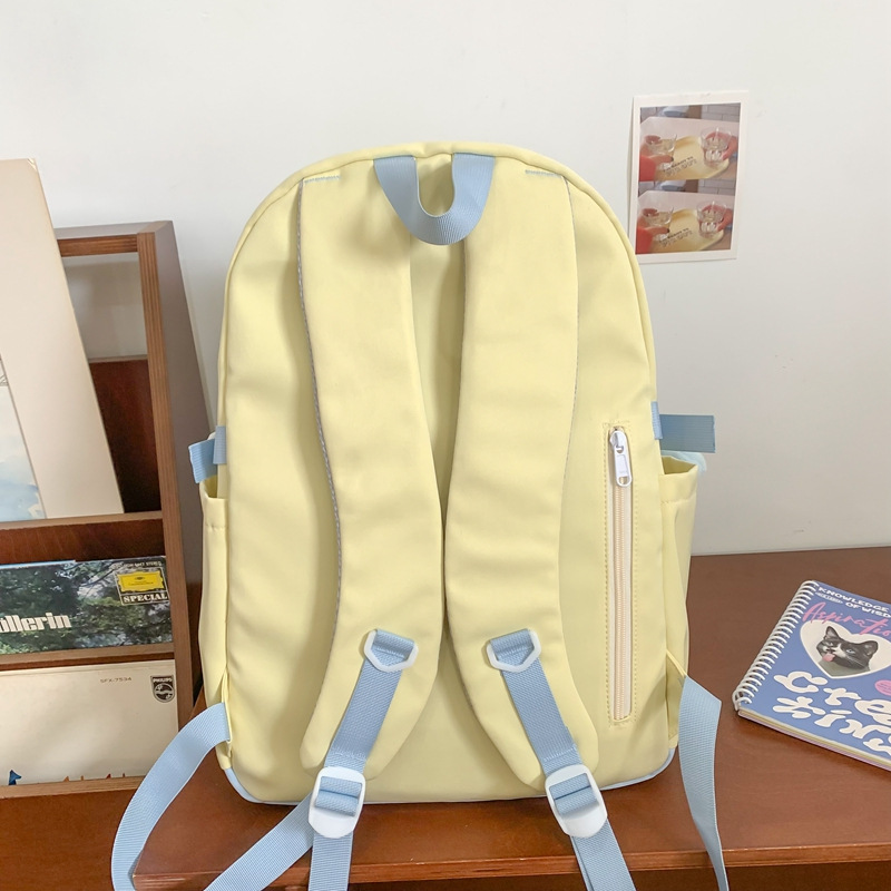 This is a simple and versatile backpack for students in grades three to six of Korean style, featuring a cute color contrast on Instagram Specification drawing