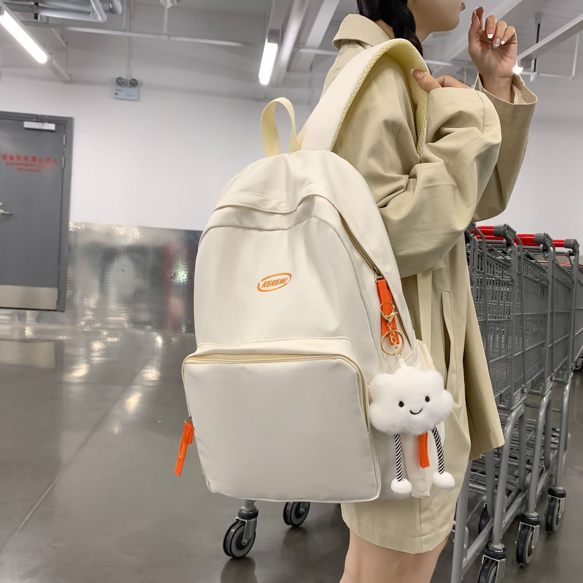 A Japanese-style InS-style soft girl backpack with a high level of appearance, solid color, simple and casual. It is a college student commuting backpack for classes details Picture