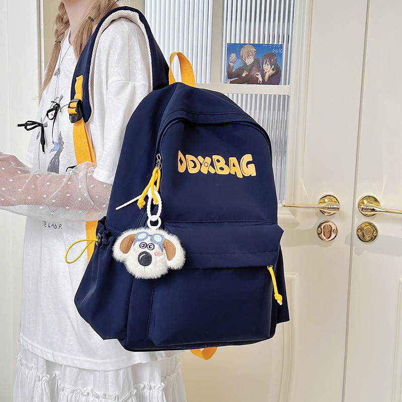 A new high-appearation-level college-style backpack for primary and secondary school students, which is casual, simple, lightweight and versatile for commuting with a large capacity details Picture