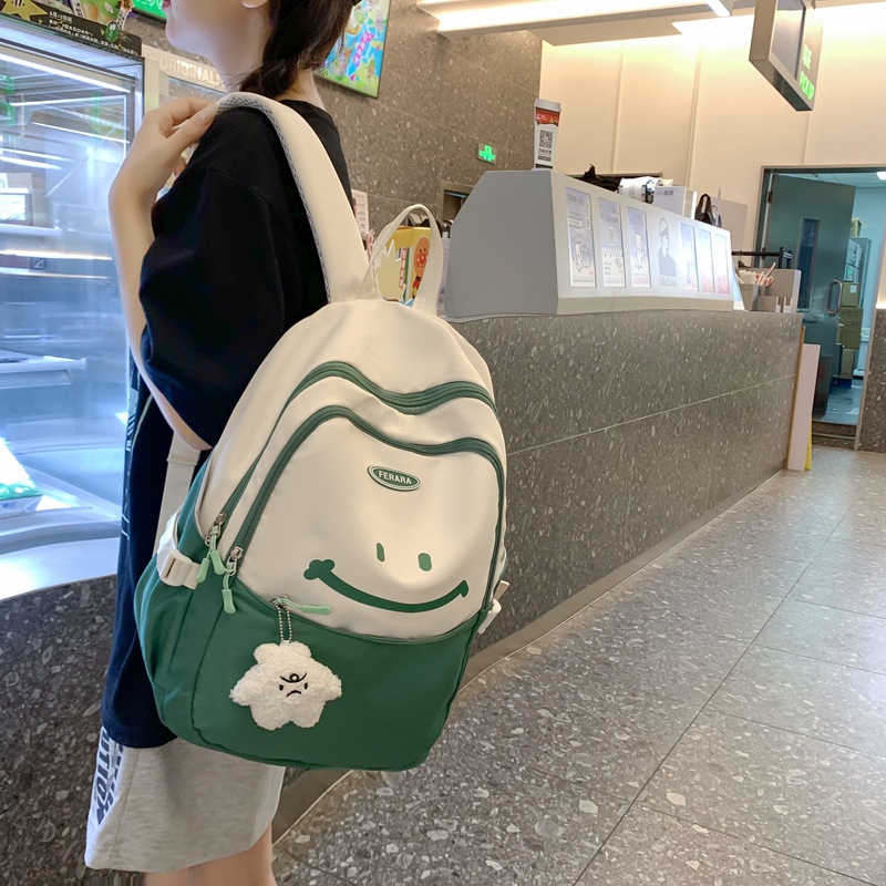 High-appearance-level large-capacity junior high school girls' color-blocking schoolbag 2024 New Korean-style lightweight design student backpack details Picture