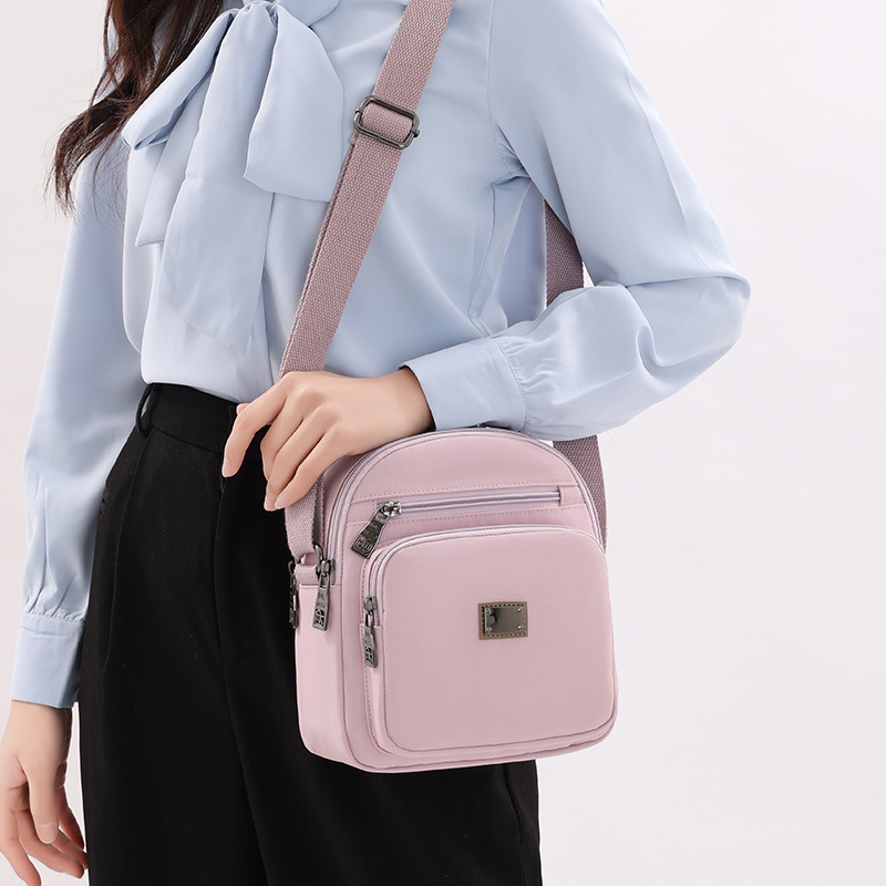 2025 New Korean-style fashionable and versatile single-shoulder bag, multi-compartment crossbody bag, large-capacity casual, simple and lightweight backpack full figure
