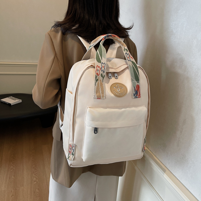 A large-capacity 2024 new casual backpack for junior and senior high school students, fashionable and versatile, trendy travel backpack full figure