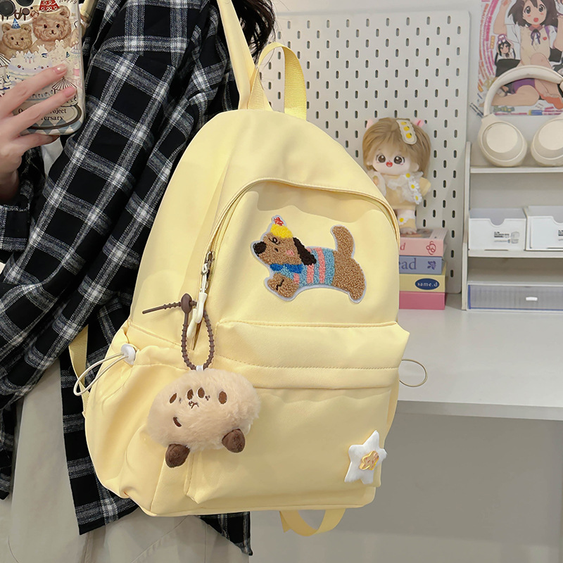 2024 New cute and cute cartoon dog backpack for women, Korean-style schoolbag, commuting backpack for classes full figure