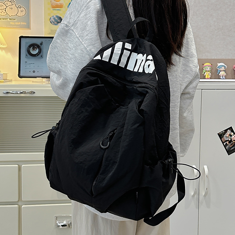 A new Japanese letter-style backpack for junior and senior high school students, which is casual, simple, lightweight, versatile and has a large capacity full figure