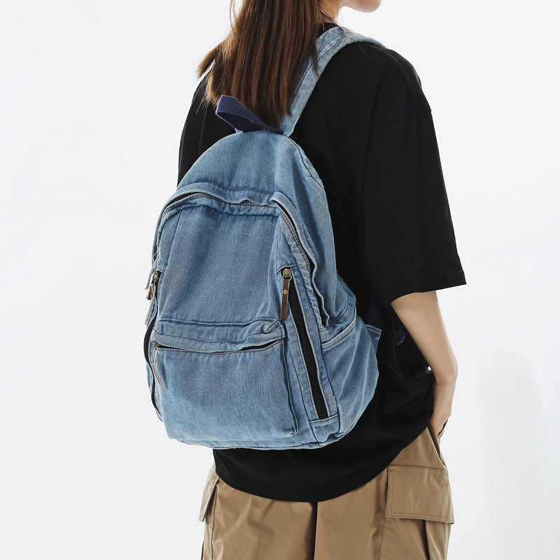 A large-capacity, simple and casual student backpack with a laid-back style, forest-themed vintage feel on Korean Instagram full figure
