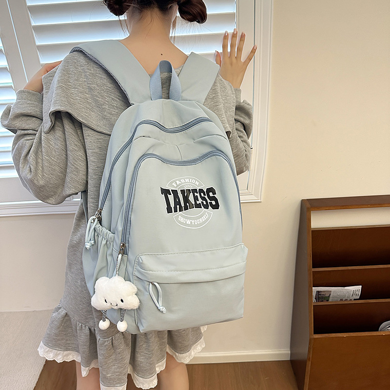New retro American-style schoolbag for female college students, simple and large-capacity backpack, lightweight and versatile, lightweight computer backpack full figure