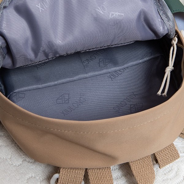 The new summer schoolbag is cute and cartoonish with contrasting colors. It's a small shopping backpack with a high appearance level. It's a dopamine crossbody backpack Application Scenario