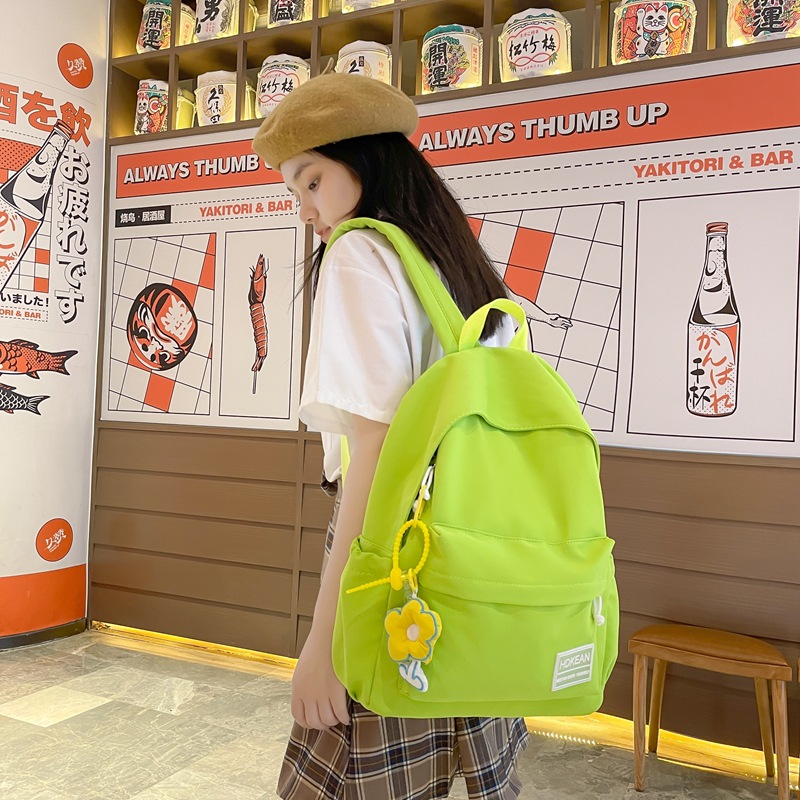 The new Korean version of Harajuku ulzzang junior and senior high school student backpack is a solid-color, fresh, cute and simple backpack full figure