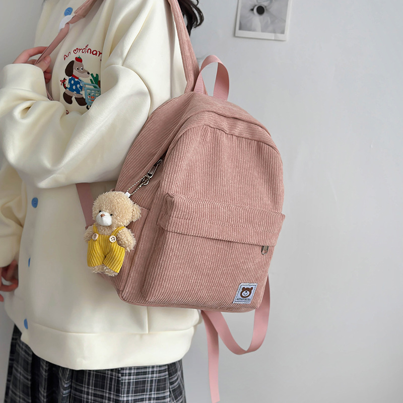 A new type of cute children's backpack with corduroy solid color, retro and simple style, featuring high appearance standards for autumn travel and study Tours details Picture