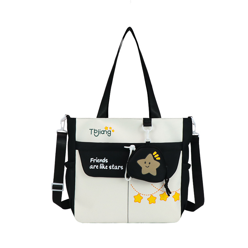 Large-capacity school-style single-shoulder bag for female primary school students to carry books for class tutoring. High appearance level and cute star-shaped crossbody bag Item Picture