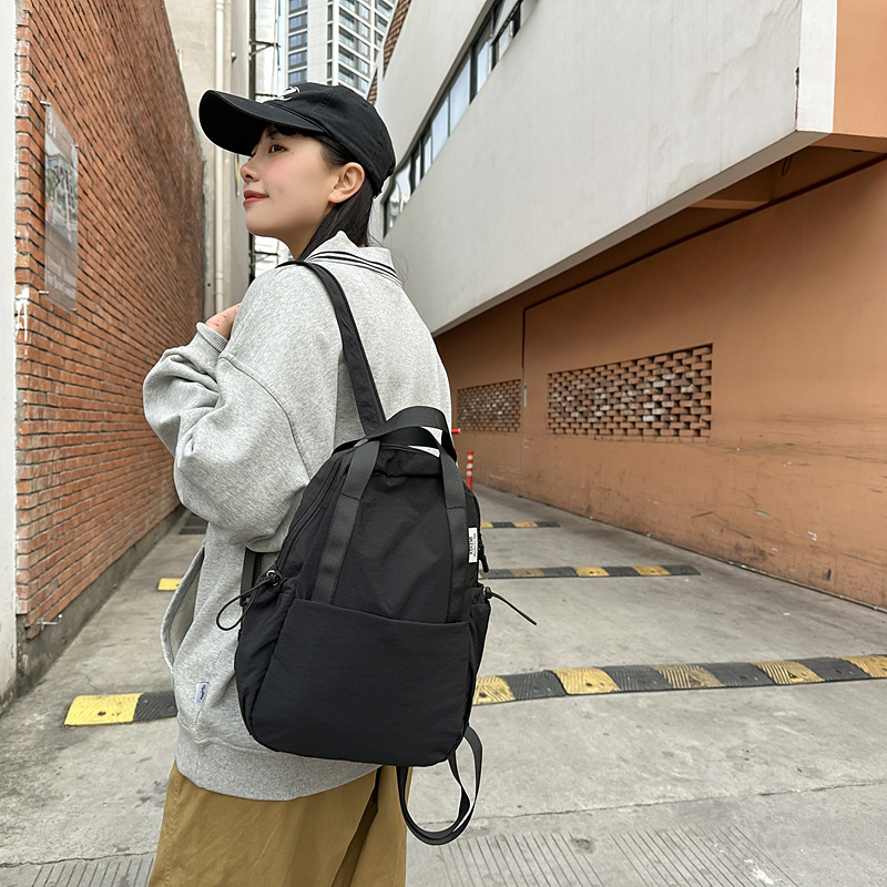 Multi-functional, simple and solid-color backpack for women, 2025 new style outdoor travel and mountaineering small backpack, single-shoulder bag, chest bag for men details Picture