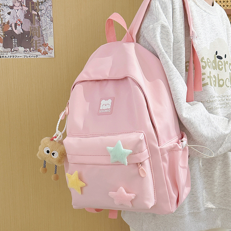 A new Japanese-style backpack with a high level of appearance, fresh, sweet and cute. It is a lightweight and large-capacity backpack for junior and senior high school students to commute full figure