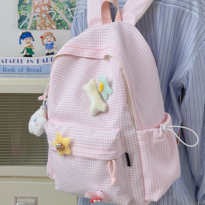 The 2025 new Japanese-style lightweight backpack for junior and senior high school students features a striped, casual, cute and star-shaped sweet schoolbag for young girls full figure