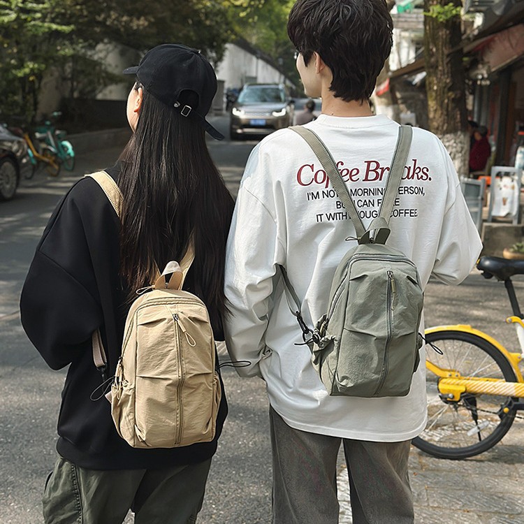 Solid-color outdoor mountaineering waterproof pleated backpack, light and casual travel crossbody bag, niche and versatile simple chest bag details Picture