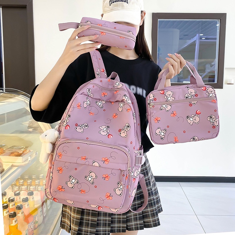Student cartoon backpack for girls, Korean version, versatile, primary school campus backpack, lightweight nylon three-piece schoolbag details Picture
