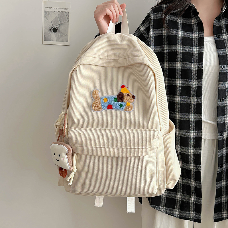 Japanese-style InS-style cute puppy schoolbag, female high school student corduroy backpack, casual college student campus backpack full figure