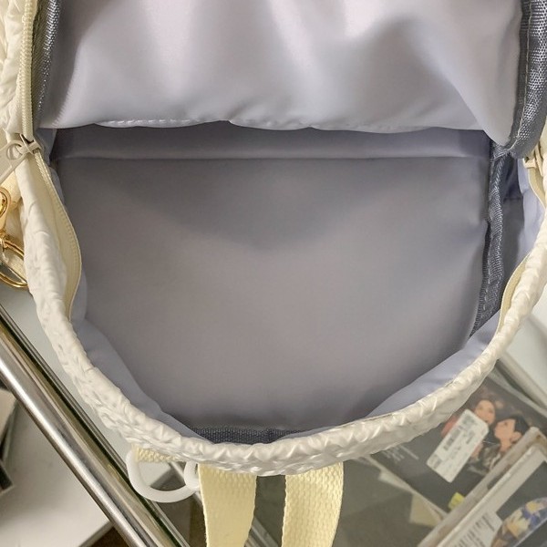 Japanese-style Instagram sweet girl travel mini backpack with high appearance level bubble grid cream series children's study backpack Application Scenario