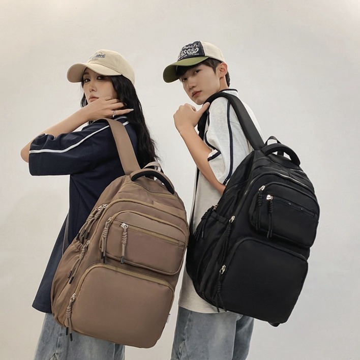Japanese college student schoolbags, cool and large-capacity, couple's high-appearance-level backpacks, Korean style Instagram casual and versatile backpacks full figure