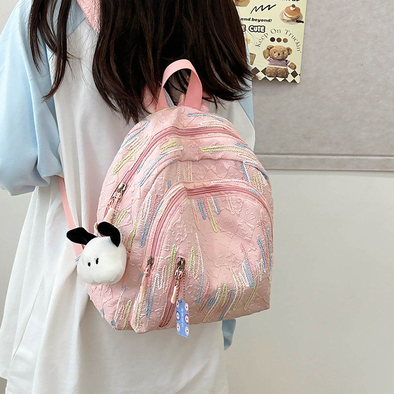A cute young girl with a high level of good looks, a small Japanese-style Instagram backpack, a bag for children traveling, a mother taking her kids shopping full figure